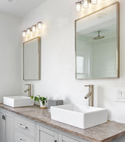 Grayson 4 Light 31" Vanity in Brushed Nickel in a room setting