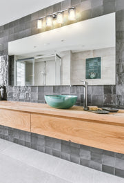 Grayson 4 Light 31" Vanity in Chrome in a room setting