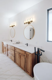 Grayson 4 Light 31" Vanity in Modern Gold in a room setting