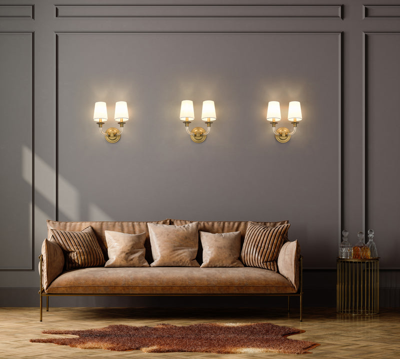 Katerina 2 Light 11.5" Wall Sconce in Rubbed Brass in a room setting