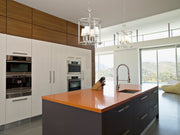 Katerina 4 Light 16" Pendant in Brushed Nickel in a room setting
