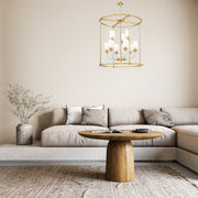 Katerina 9 Light 28" Pendant in Rubbed Brass in a room setting