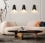 Salone 1 Light 7" Wall Sconce in Matte Black in a room setting