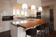 Madeline 4 Light 12" Pendant in Brushed Nickel in a room setting