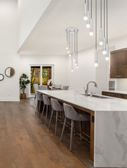 Stari 5 Light 12" Pendant in Brushed Nickel in a room setting