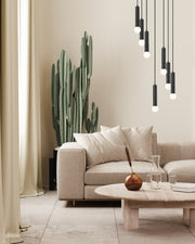 Stari 5 Light 12" Pendant in Matte Black in a room setting