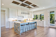 Stari 7 Light 54" Linear Pendant in Matte Black in a room setting