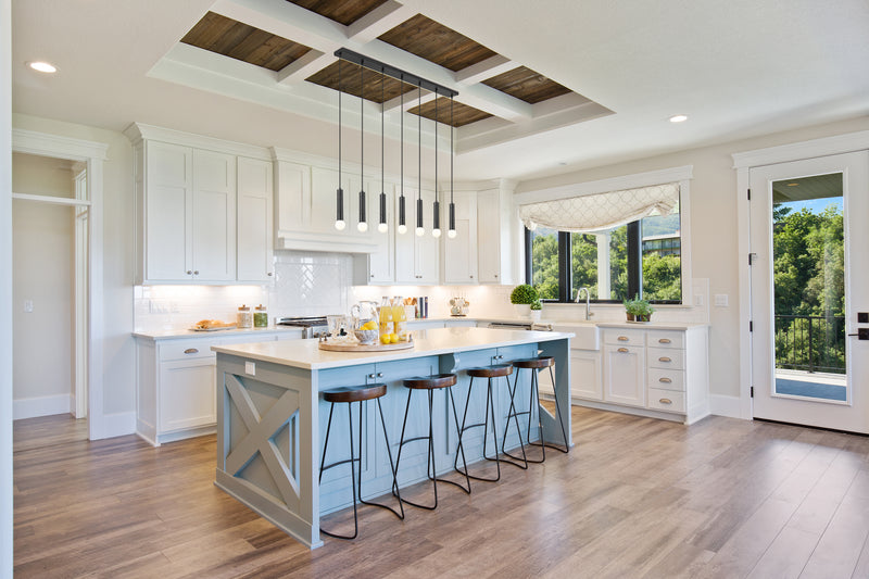 Stari 7 Light 54" Linear Pendant in Matte Black in a room setting