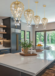 Gabriella 3 Light 9" Pendant in Modern Gold in a room setting