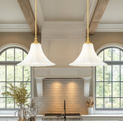 Fleur 1 Light 16" Pendant in Modern Gold in a room setting