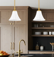 Fleur 1 Light 8" Pendant in Modern Gold in a room setting