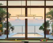 Benoit 1 Light 44" Linear Pendant in Modern Gold in a room setting