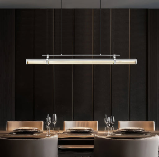 Benoit 1 Light 56" Linear Pendant in Brushed Nickel in a room setting