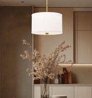 Linden 1 Light 12" Pendant in Modern Gold in a room setting