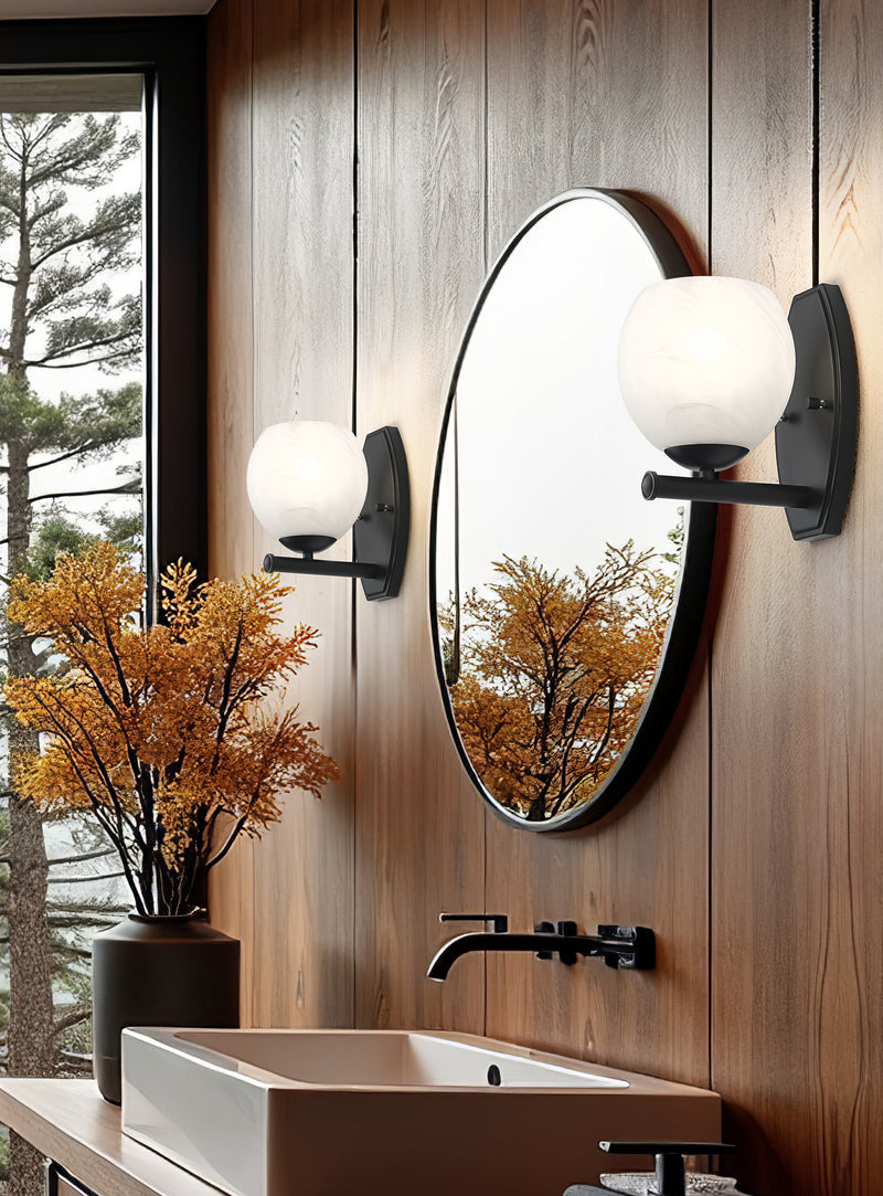 Colette 1 Light 6" Wall Sconce in Matte Black in a room setting