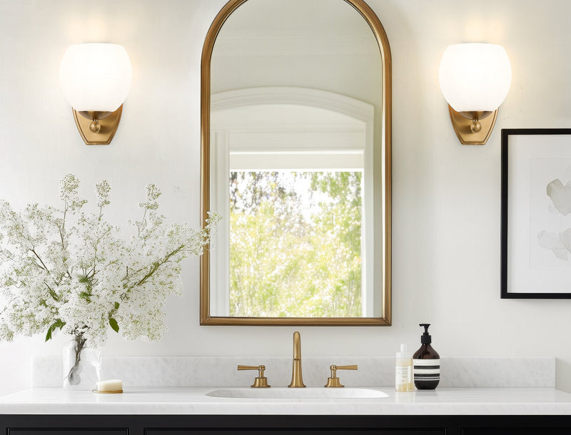 Colette 1 Light 6" Wall Sconce in Modern Gold in a room setting