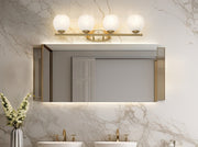 Colette 4 Light 32" Vanity in Modern Gold in a room setting