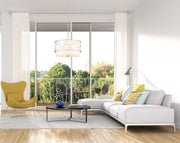 Kendall 4 Light 24" Pendant in Brushed Nickel in a room setting
