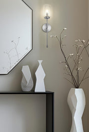 Dominique 1 Light 5.75" Wall Sconce in Brushed Nickel in a room setting