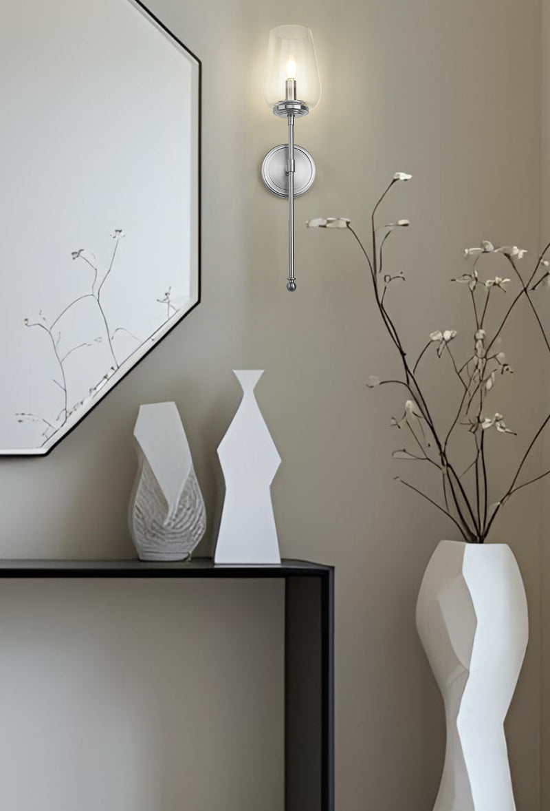 Dominique 1 Light 5.75" Wall Sconce in Brushed Nickel in a room setting