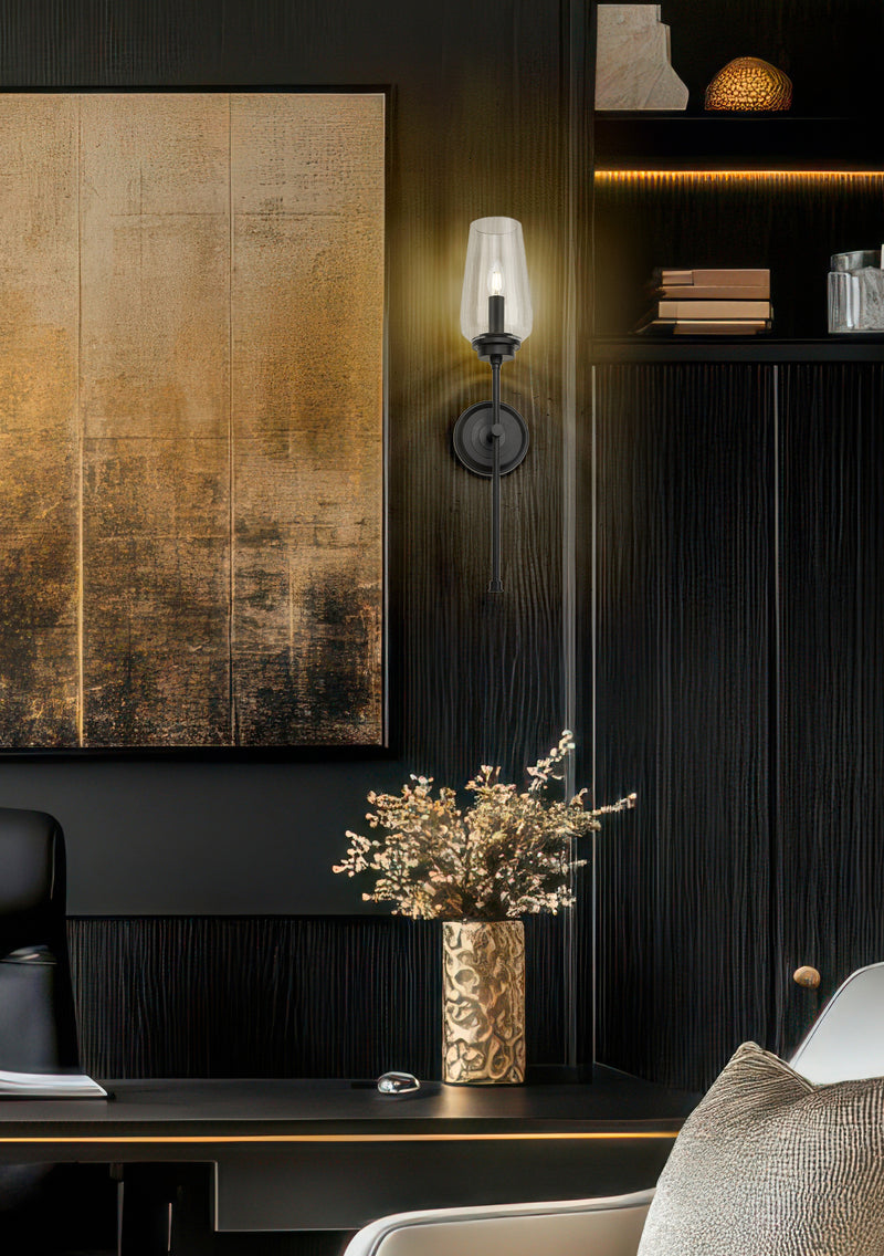 Clara 1 Light 5.5" Wall Sconce in Matte Black in a room setting