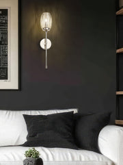 Cassian 1 Light 5.5" Wall Sconce in Polished Nickel in a room setting