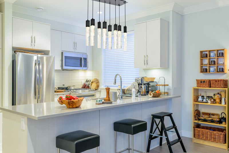 Aurora 36" 8-Light Linear Pendant in Black And Clear