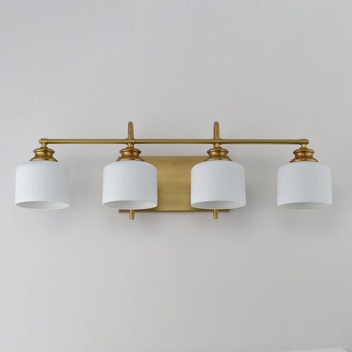 Bisque 4 Light Bath Vanity Light in Natural Aged Brass