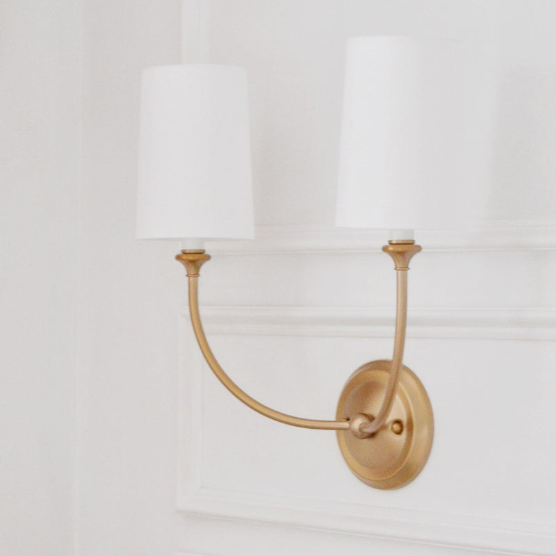 Sylvan 2 Light 15.5" Sconce in Vibrant Gold in a room setting