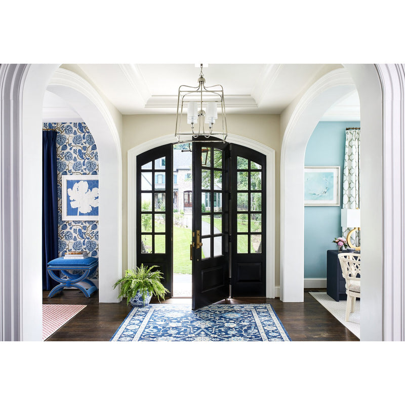 Sylvan 4 Light 21.5" Chandelier in Polished Nickel in a room setting