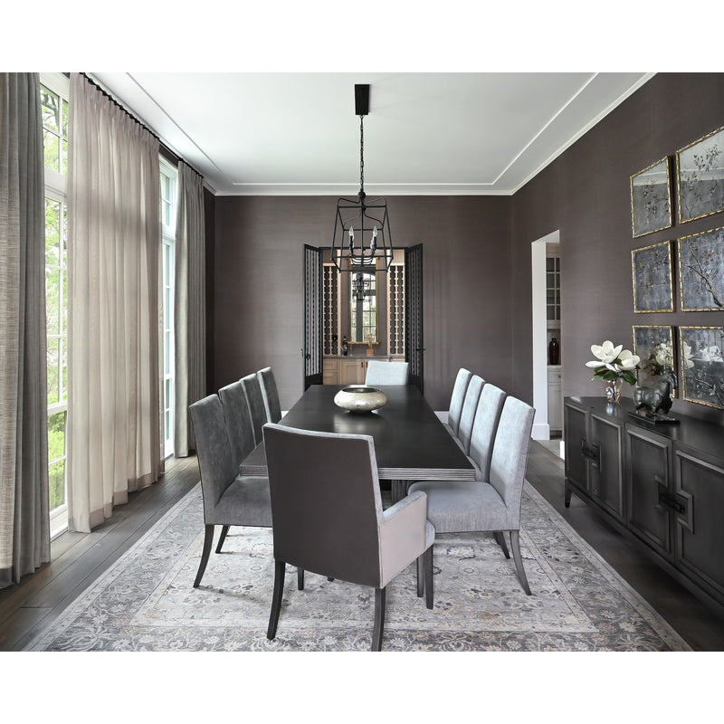 Sylvan 8 Light 42" Linear Chandelier in Black Forged in a room setting
