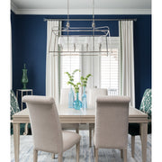 Sylvan 8 Light 42" Linear Chandelier in Polished Nickel in a room setting