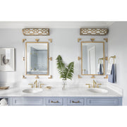 Jennings 1 Light 24" Integrated LED Bathroom Vanity in Aged Brass in a room setting