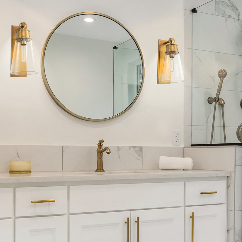 Wentworth 1 Light 7.5" Wall Sconce in Rubbed Brass in a room setting