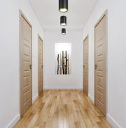 Arlo 1 Light 5.25" Flush Mount in Matte Black + Rubbed Brass in a room setting