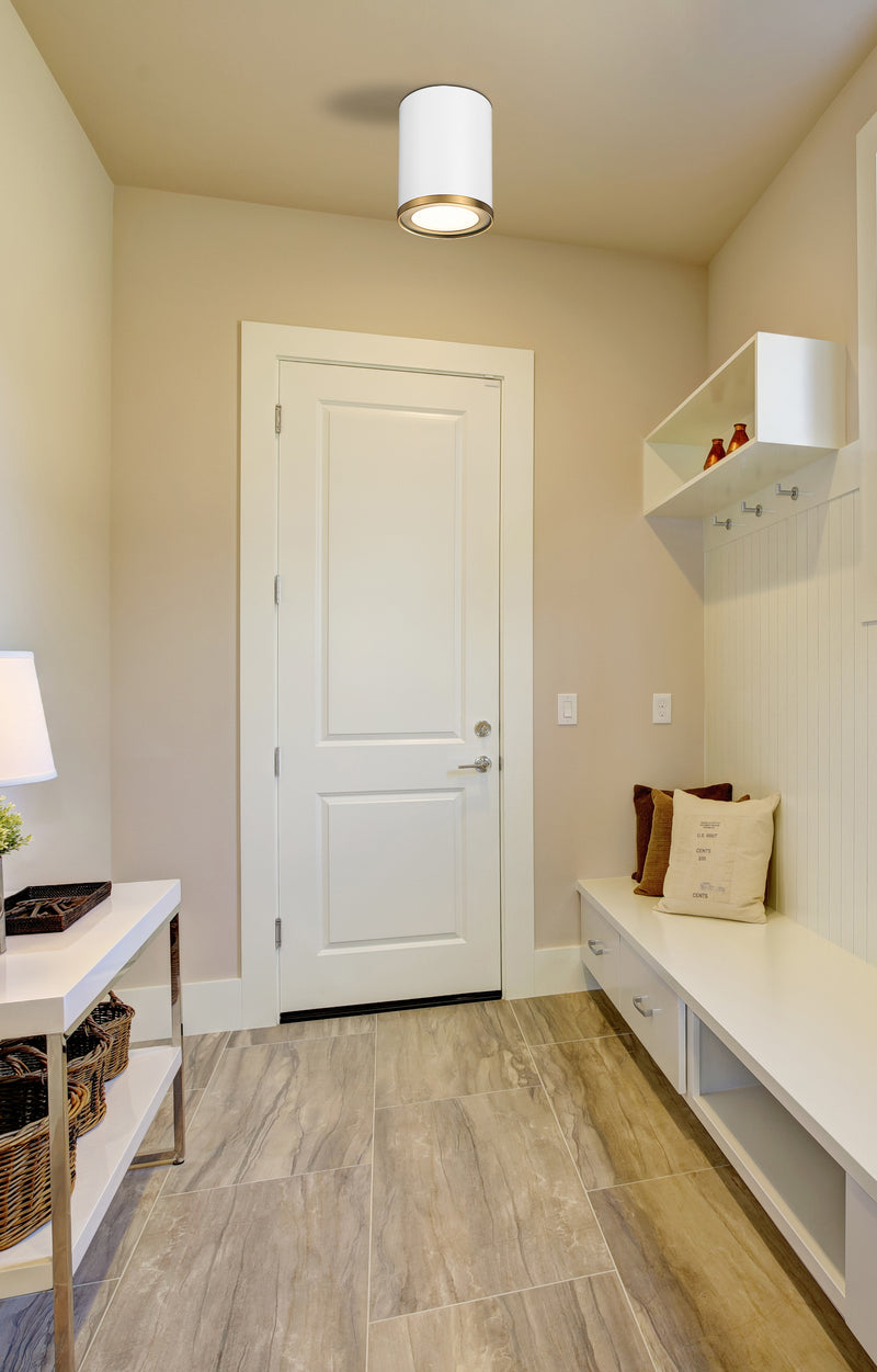 Arlo 1 Light 5.25" Flush Mount in Matte White + Rubbed Brass in a room setting