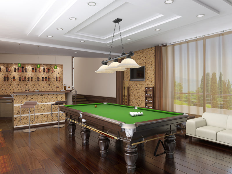 Cordon 3 Light 58" Billiard, Glass Shades in Bronze Plate in a room setting
