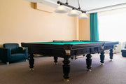 Cordon 3 Light 57.25" Billiard, Glass Shades (A) in Bronze in a room setting