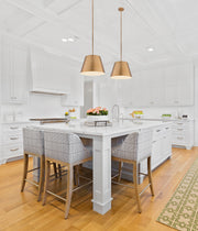 Lilly 1 Light 18" Pendant in Modern Gold in a room setting