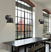 Lilly 1 Light 8" Wall Sconce in Matte Black in a room setting