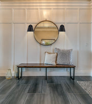 Lilly 1 Light 8" Wall Sconce in Matte Black in a room setting