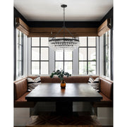 Calypso 6 Light 25" Chandelier in Matte Black in a room setting