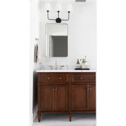 Sylvan 3 Light 23.25" Bathroom Vanity in Black Forged in a room setting