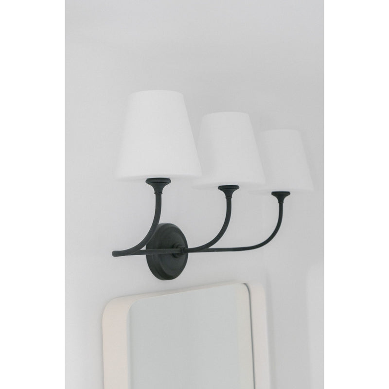 Sylvan 3 Light 23.25" Bathroom Vanity in Black Forged in a room setting