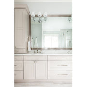 Sylvan 3 Light 23.25" Bathroom Vanity in Polished Chrome in a room setting
