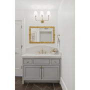 Sylvan 3 Light 23.25" Bathroom Vanity in Vibrant Gold in a room setting