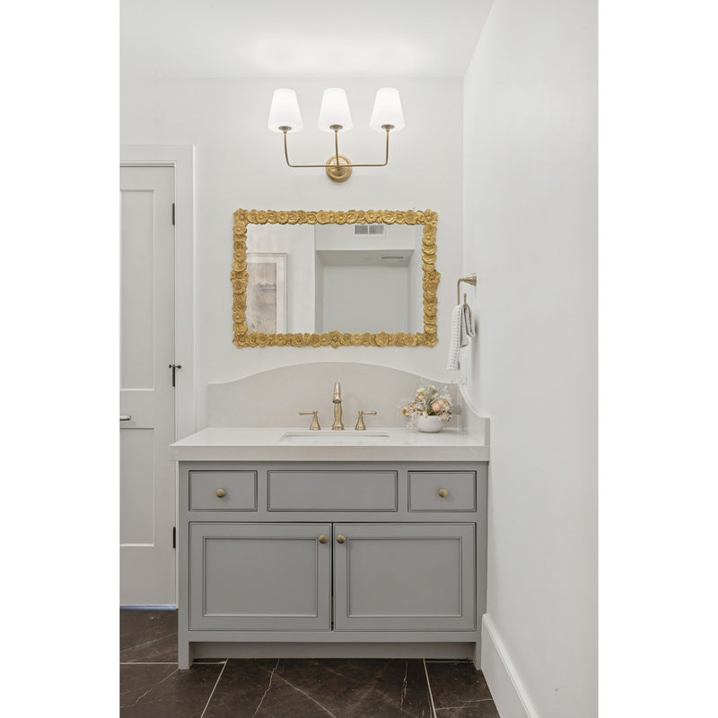 Sylvan 3 Light 23.25" Bathroom Vanity in Vibrant Gold in a room setting