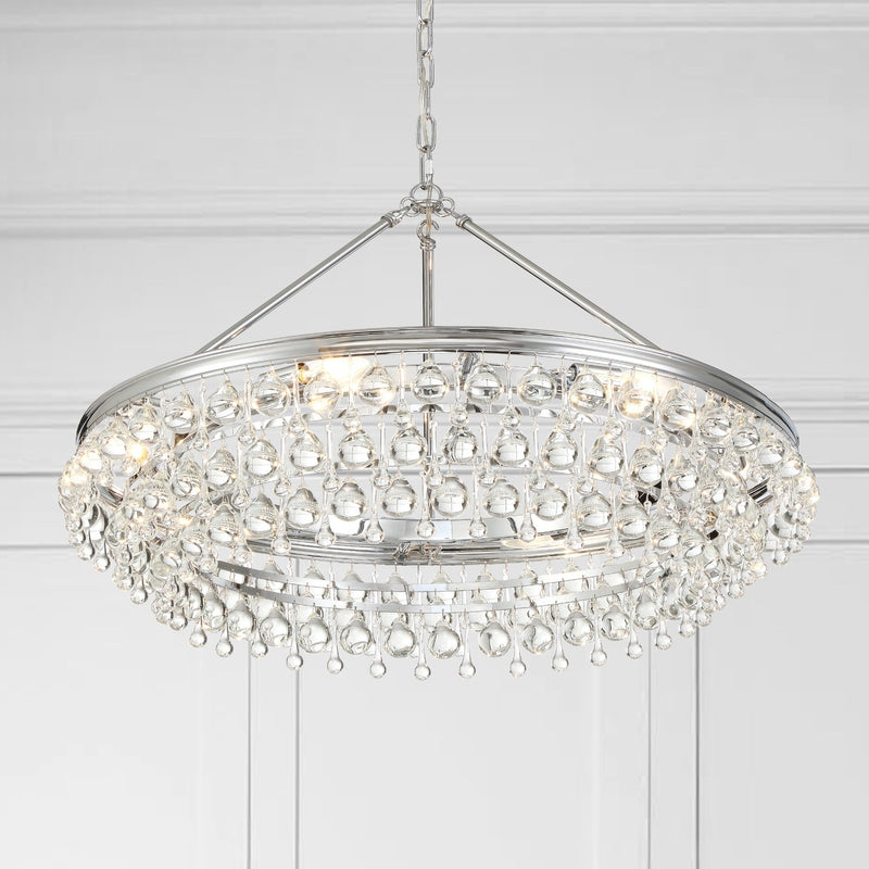 Calypso 6 Light 30" Chandelier in Polished Chrome in a room setting