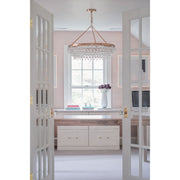 Calypso 6 Light 30" Chandelier in Vibrant Gold in a room setting