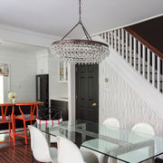 Calypso 6 Light 30" Chandelier in Vibrant Bronze in a room setting